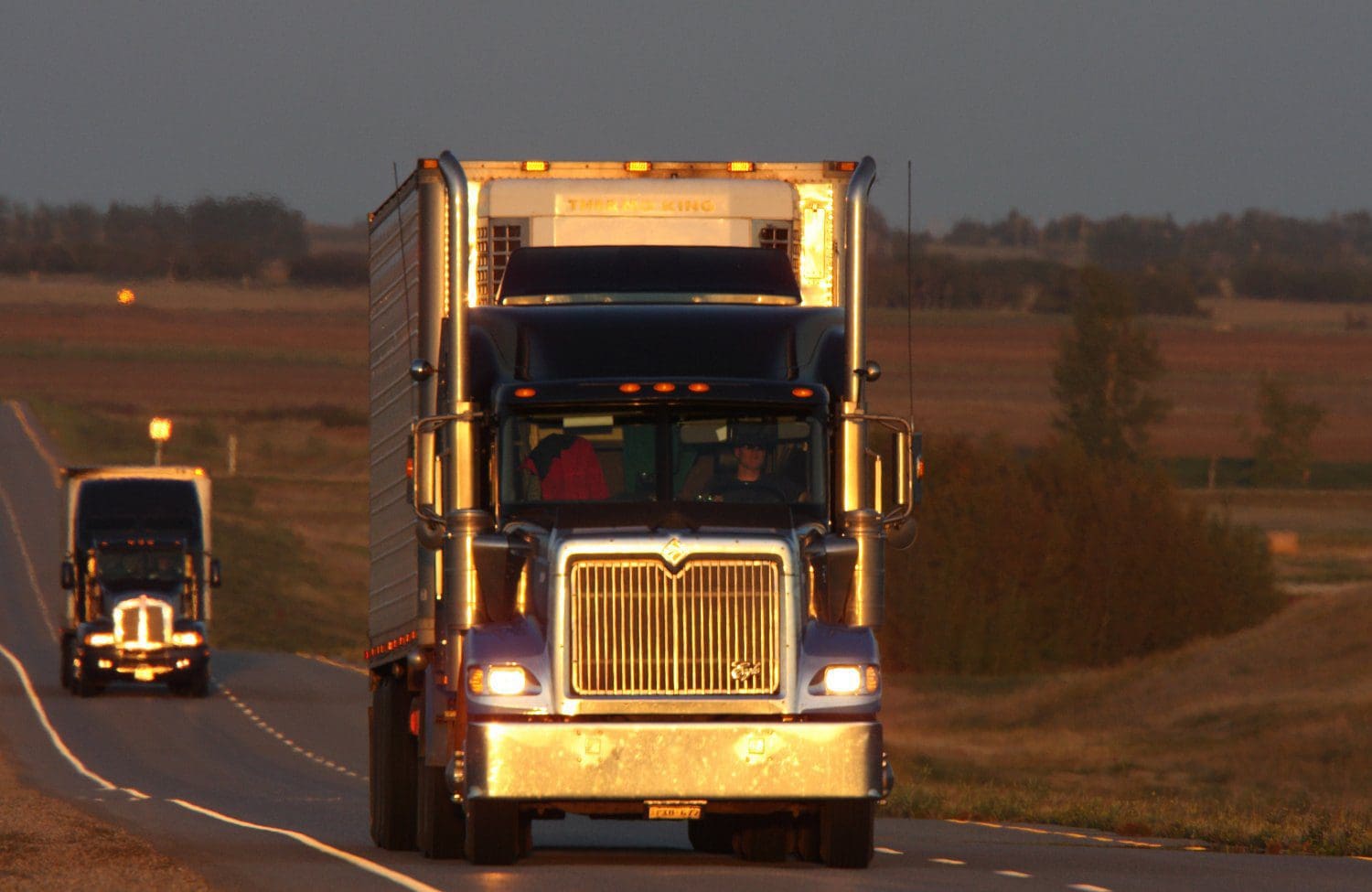 semi-truck drives along Riverview highway