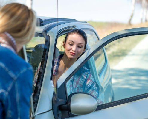 two women try to determine fault after a car accident