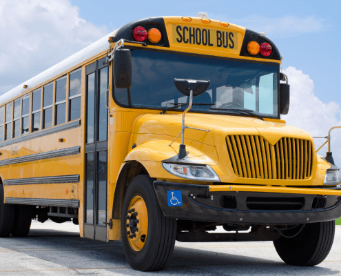 An 8-year-old passenger was killed after a school bus was hit by a driver