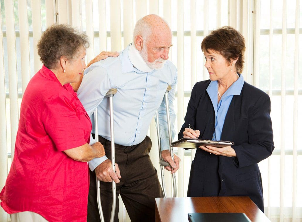Man discusses a personal injury claim with a personal injury lawyer in Florida.